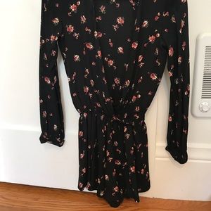 Black long sleeve floral romper with pink flowers